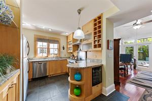 Updated kitchen with stainless appliances and granite counters.