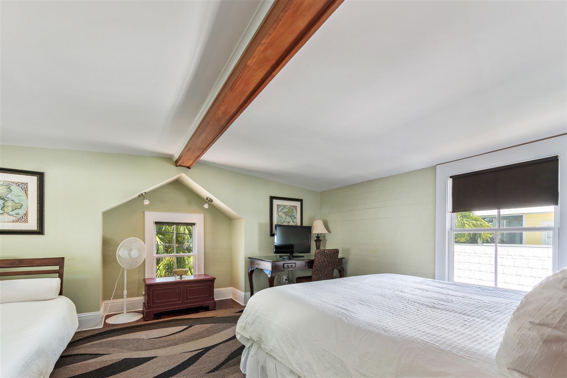 Spacious primary bedroom is located on the second level.