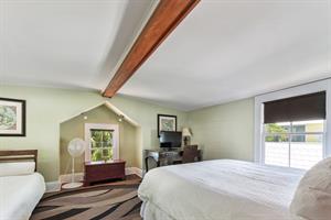 Spacious primary bedroom is located on the second level.