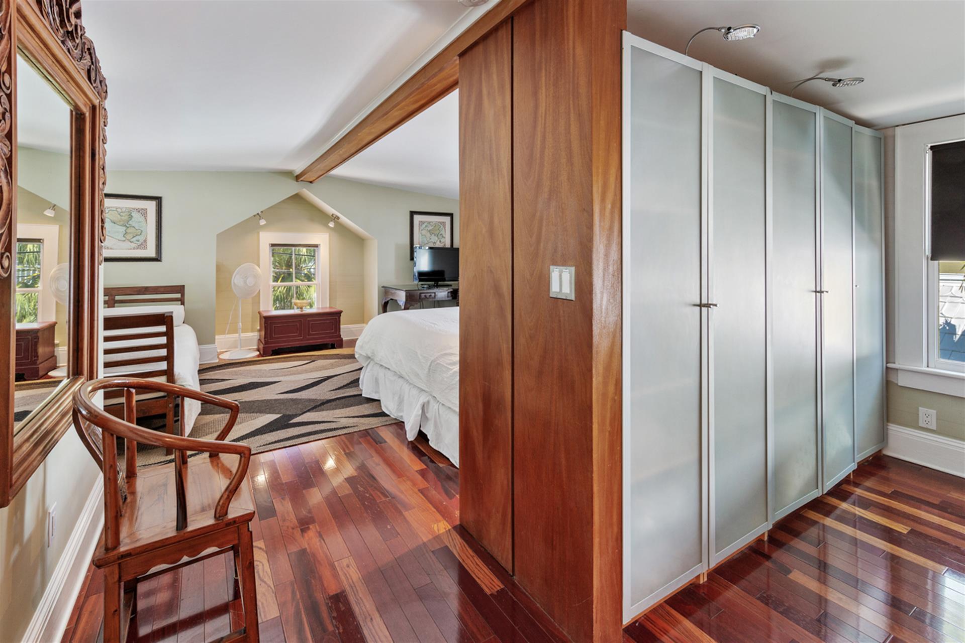 Large closet located between bed and bath areas.