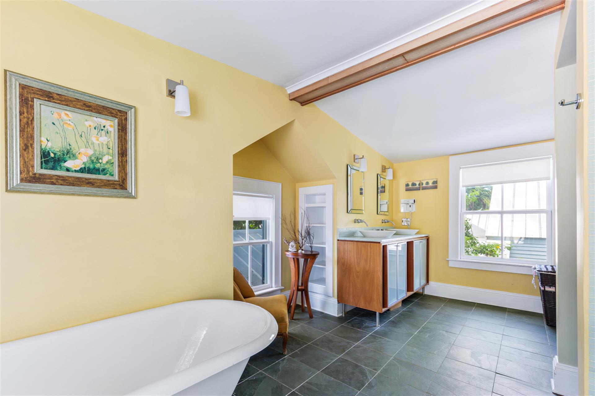 Primary bath offers plenty of natural lighting.