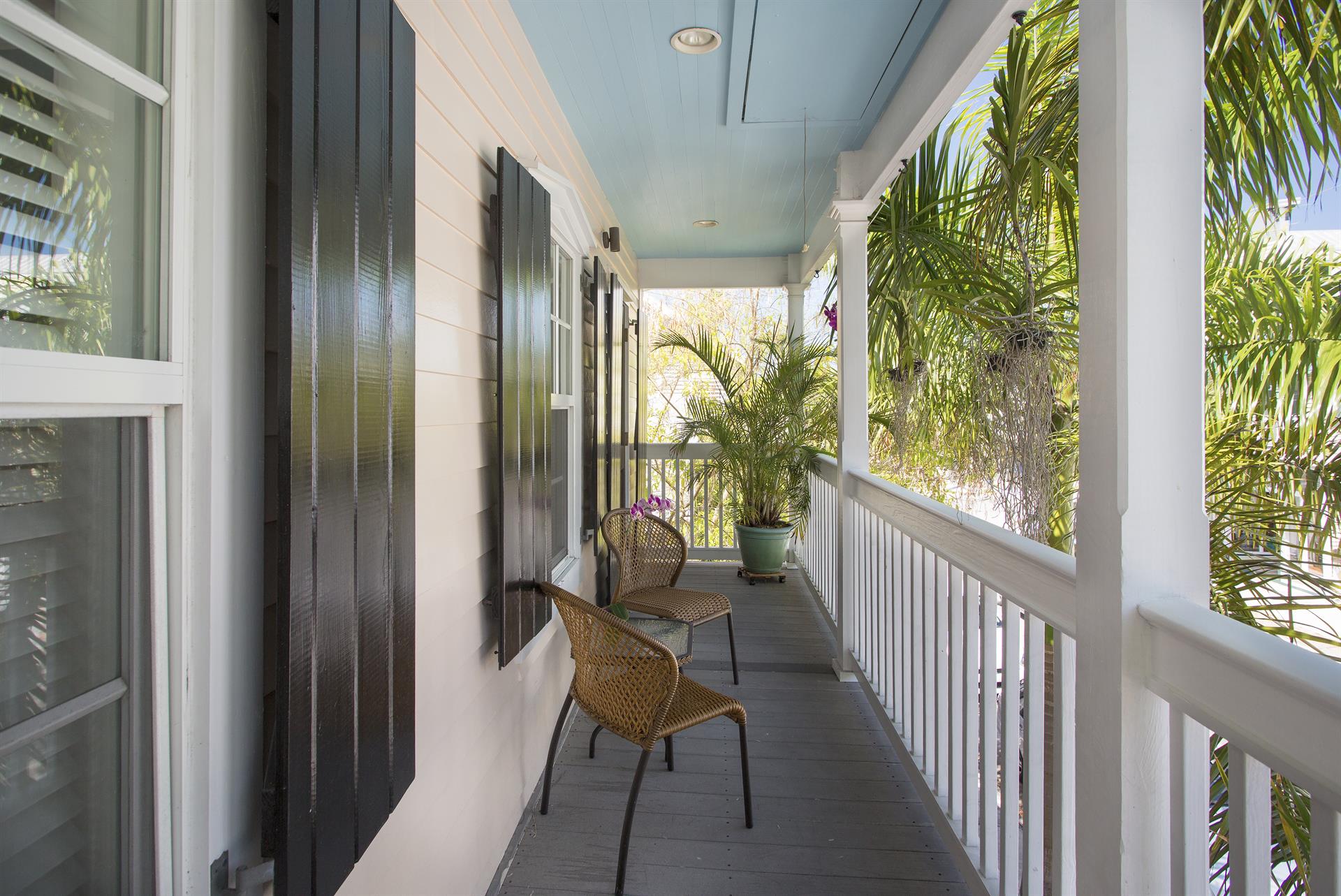 The upstairs porch is great for morning coffee
