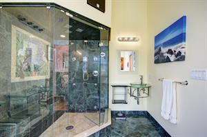 Stunning walkin glass shower.