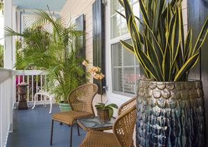 This front porch will make your Cuban cafe con leche sweeter