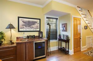 First floor wet bar and wine fridge are a bonus