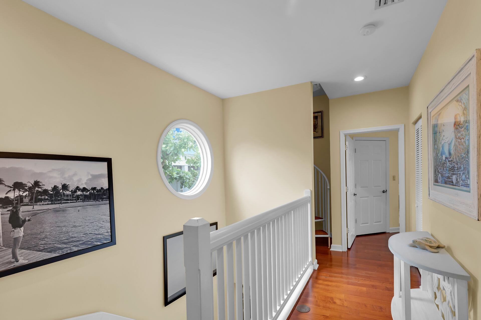 Second story hall with porthole view