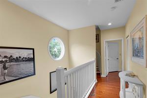 Second story hall with porthole view