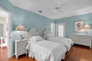 Guest room has access to the second story balcony.