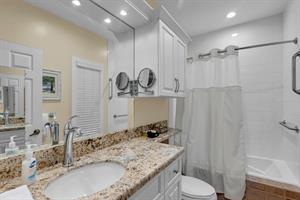 Guest bath with tubshower combo.