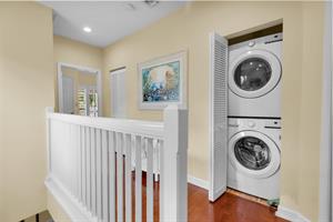 Full size washer and dryer on the second floor.