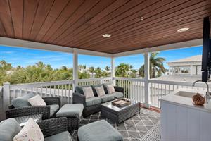 Third floor deck with comfy seating