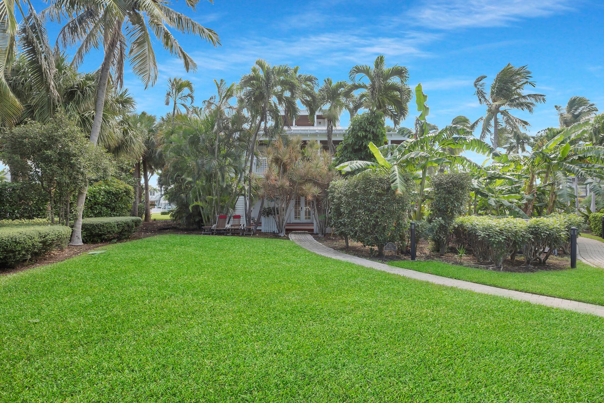 Lush tropical foliage adds to the privacy.