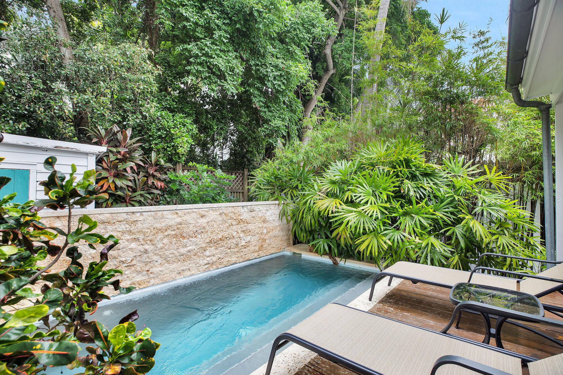 Lush tropical foliage adds to the privacy.