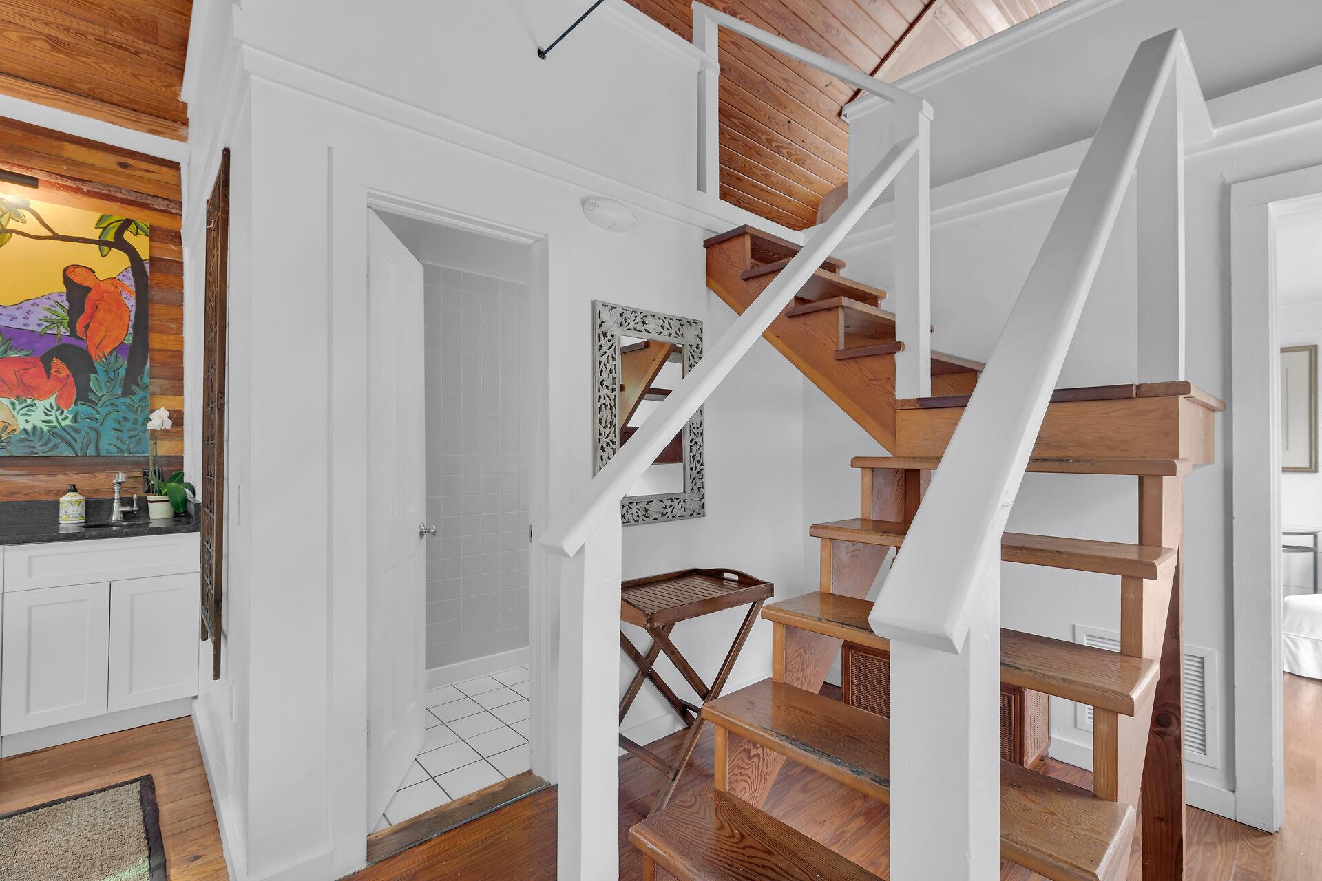 Full bath near the stairs to the loft lets go up