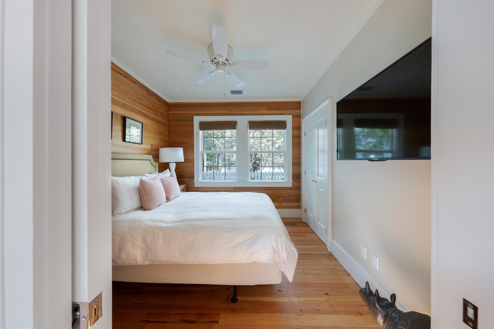 Spacious queen bedroom with your own TV