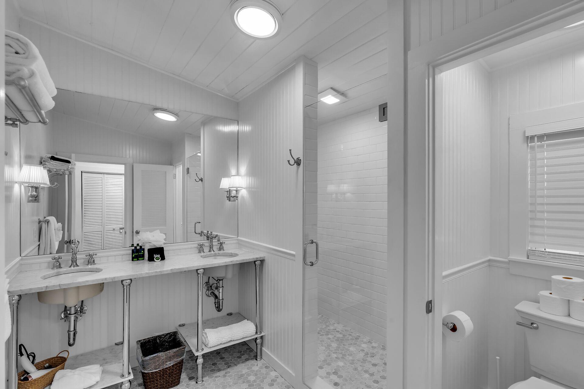 Gorgeous primary ensuite with double sinks and walkin shower