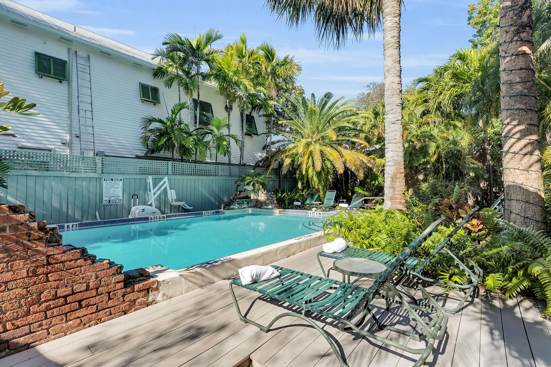 Shared pool with loungers for relaxing