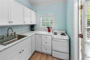 Bright crisp kitchen with drip coffee maker