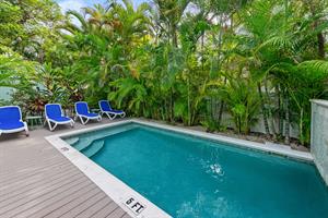 Shared pool with loungers for relaxing