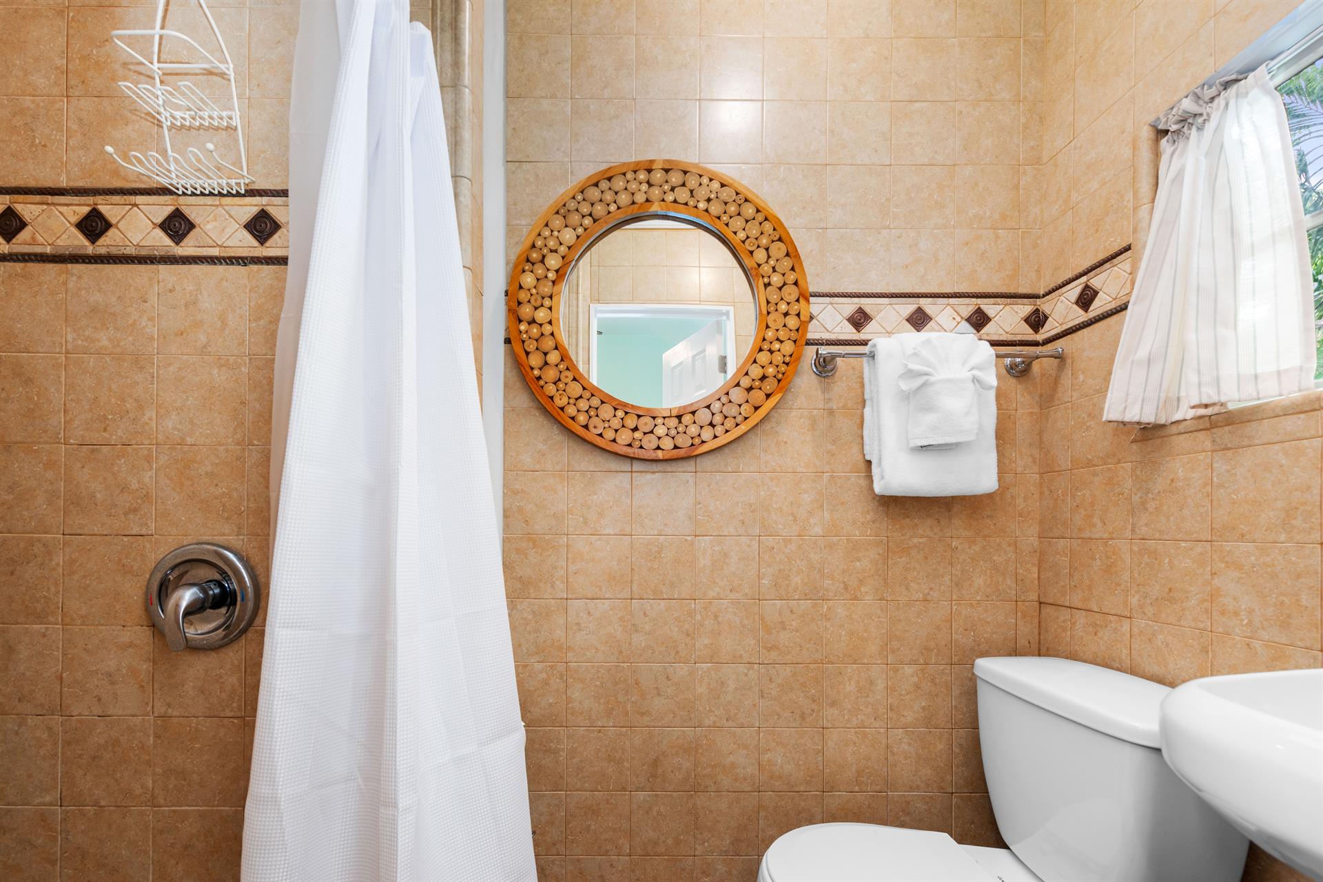 Tile bathroom with walkin shower