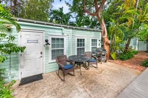 Robinson Crusoe Cottage with quaint patio area