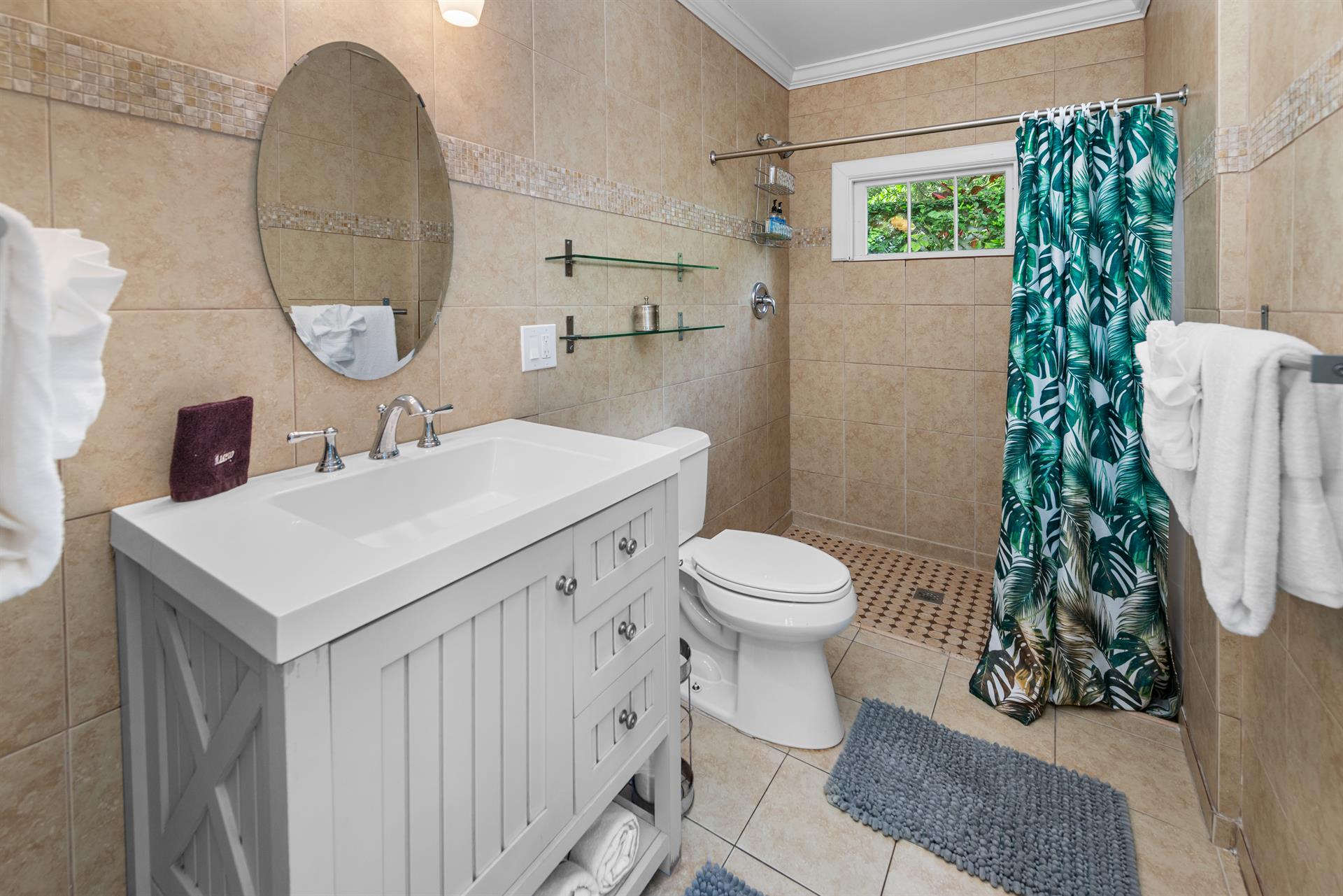 Ample hall bath with walkin shower
