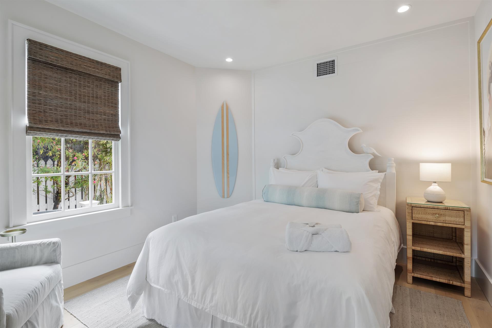 First floor queen bedroom with luxurious linens