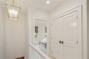 Bright, clean second floor hall.