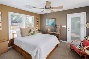 Queen bed in primary bedroom.