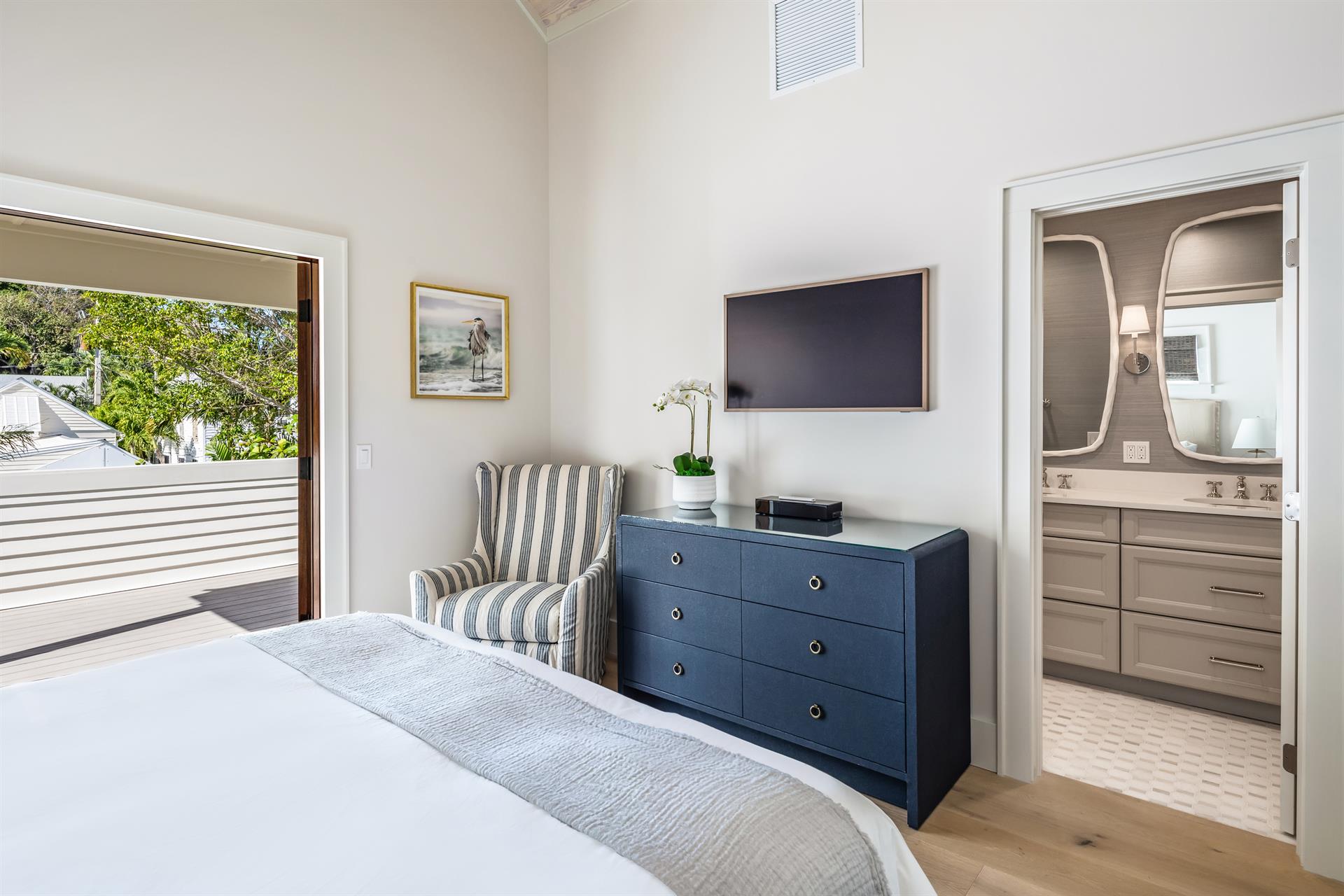 TV, dresser and seating to complete the primary suite.