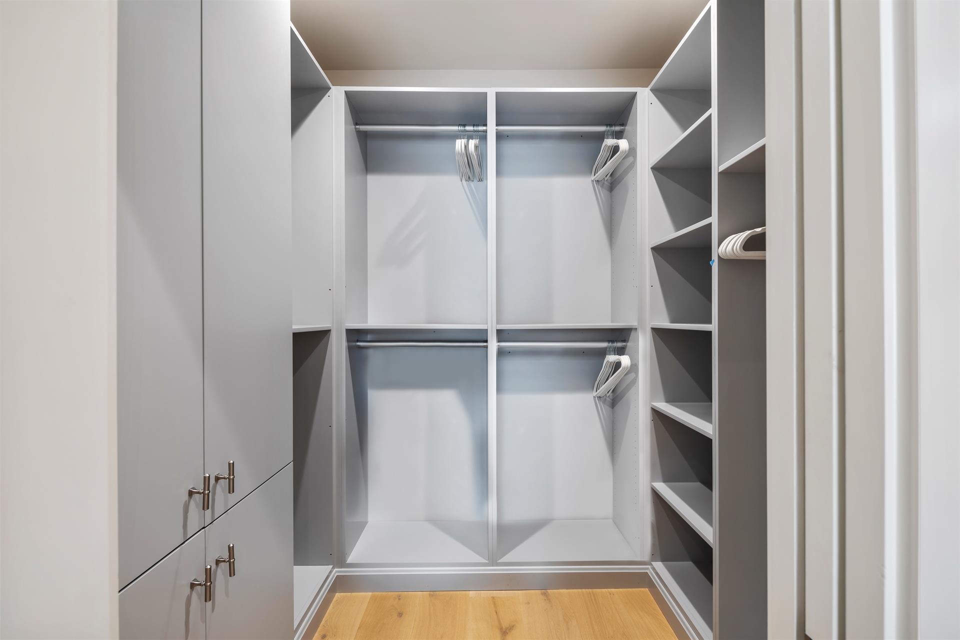 Spacious walkin closet in primary suite.