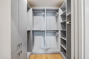 Spacious walkin closet in primary suite.