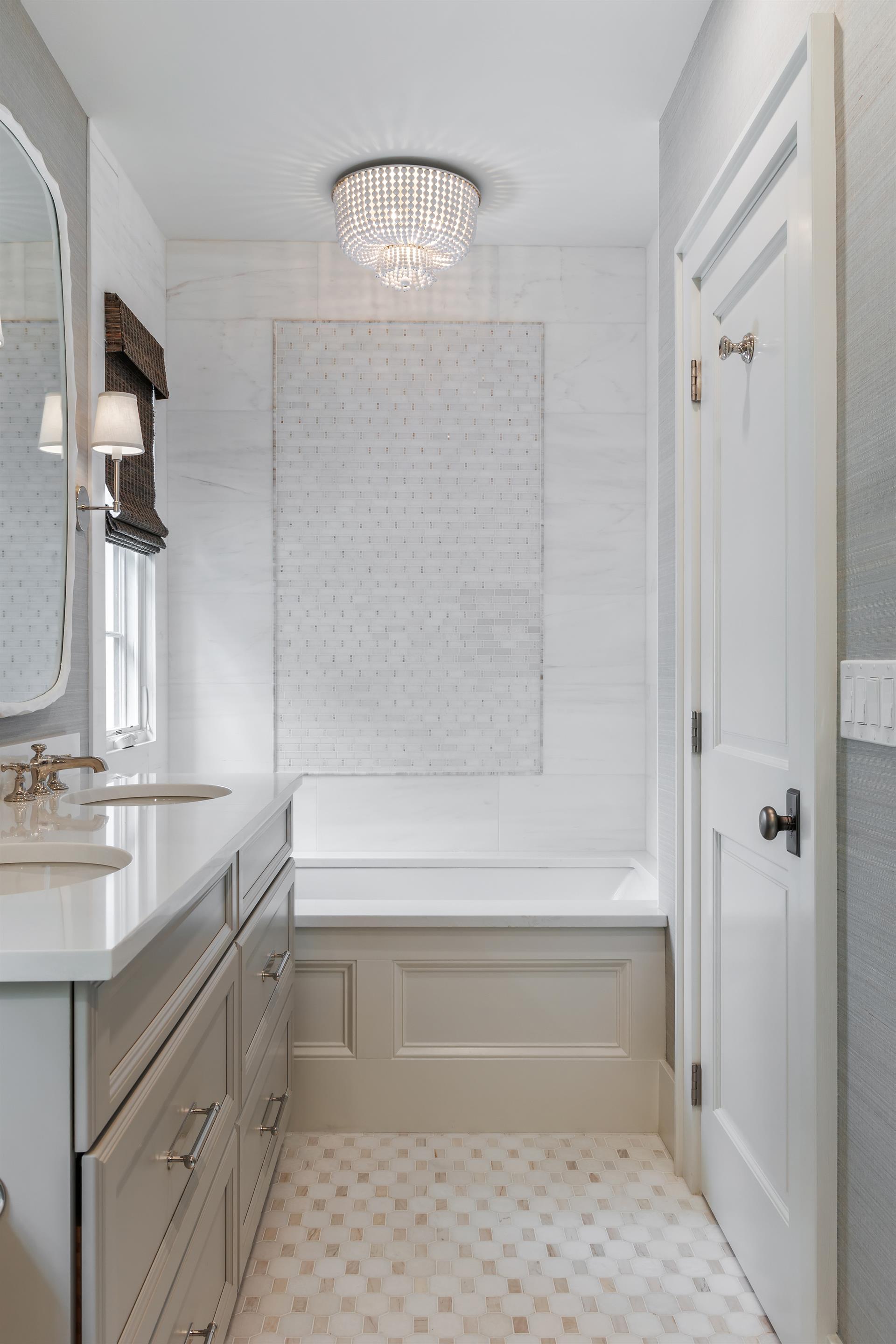Large soaking tub also located in primary ensuite.