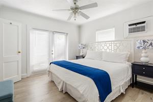 King bed, wall AC and dual nightstands