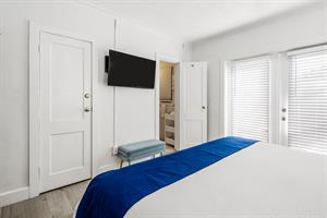 King bedroom has French doors that open to hot tub.