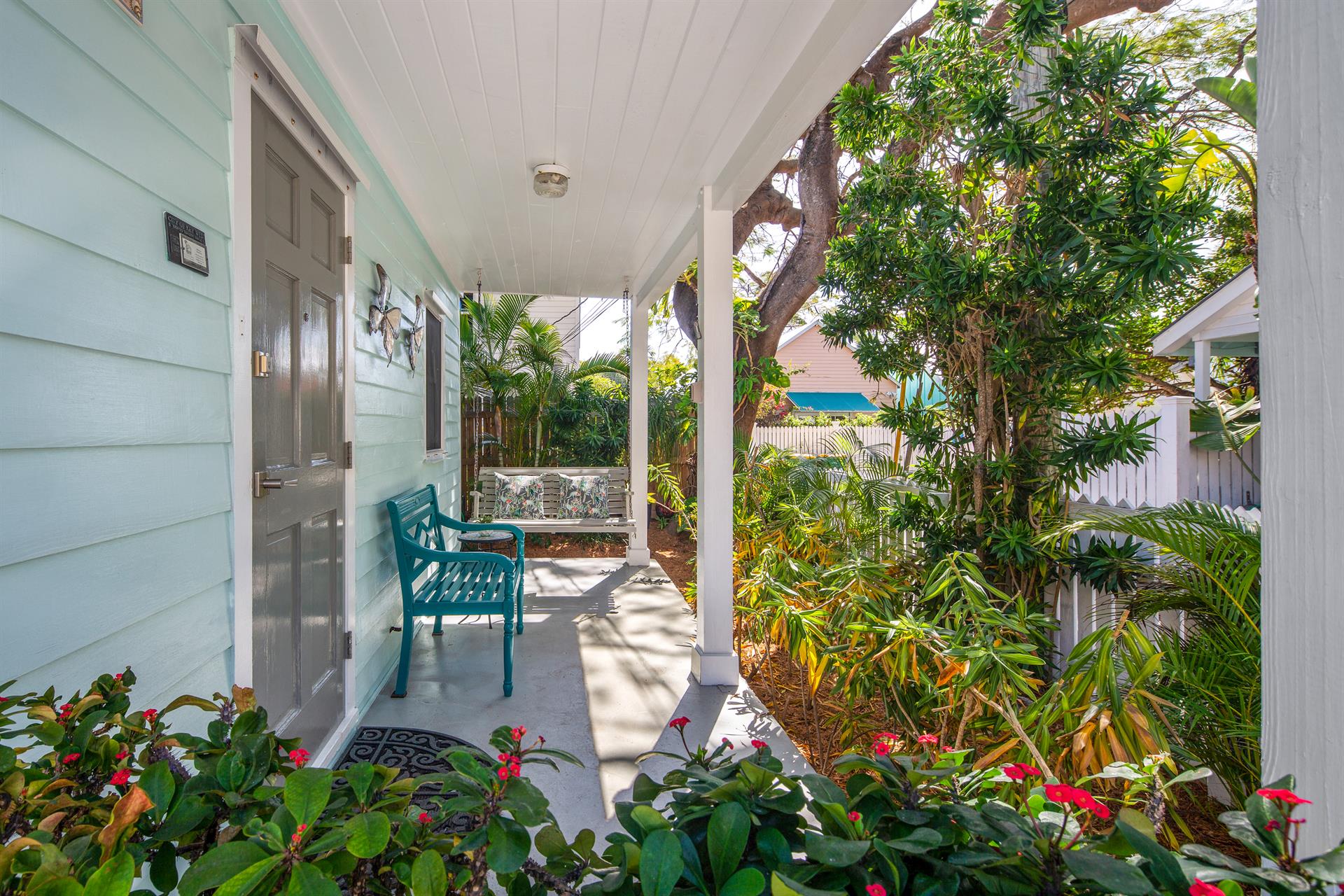 Feel the tropical vibe on this great front porch