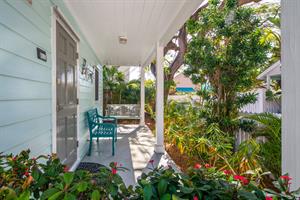 Feel the tropical vibe on this great front porch