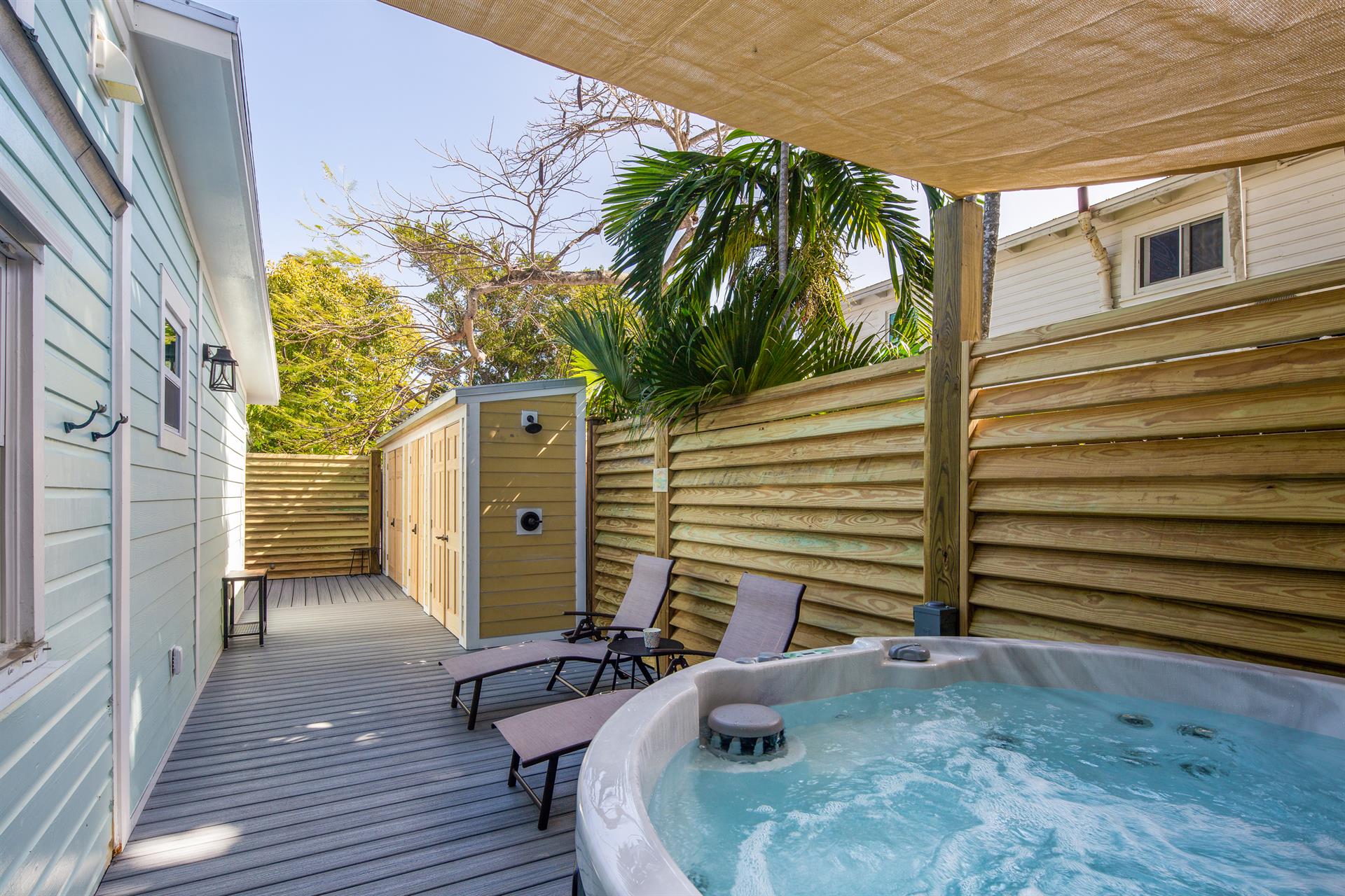 Enjoy relaxing in this private hot tub on the deck