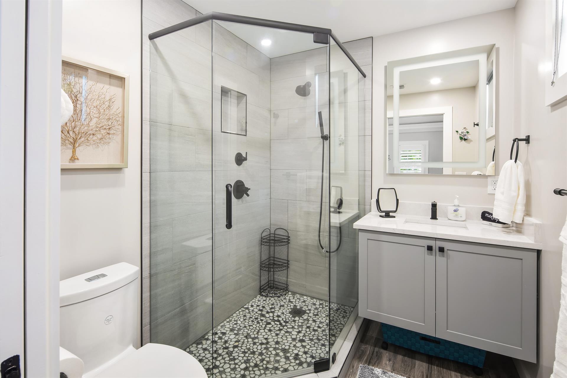 Primary ensuite bath with glass walkin shower