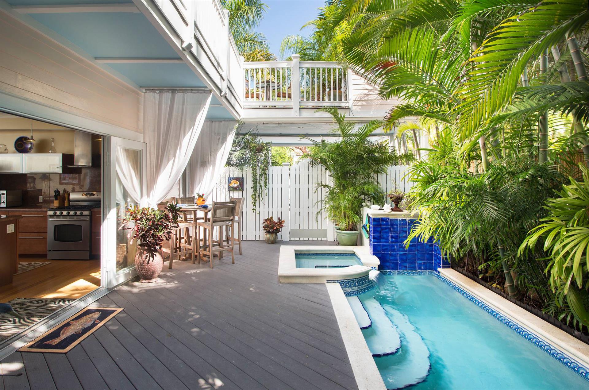 Private pool with sitting pool and outdoor seating