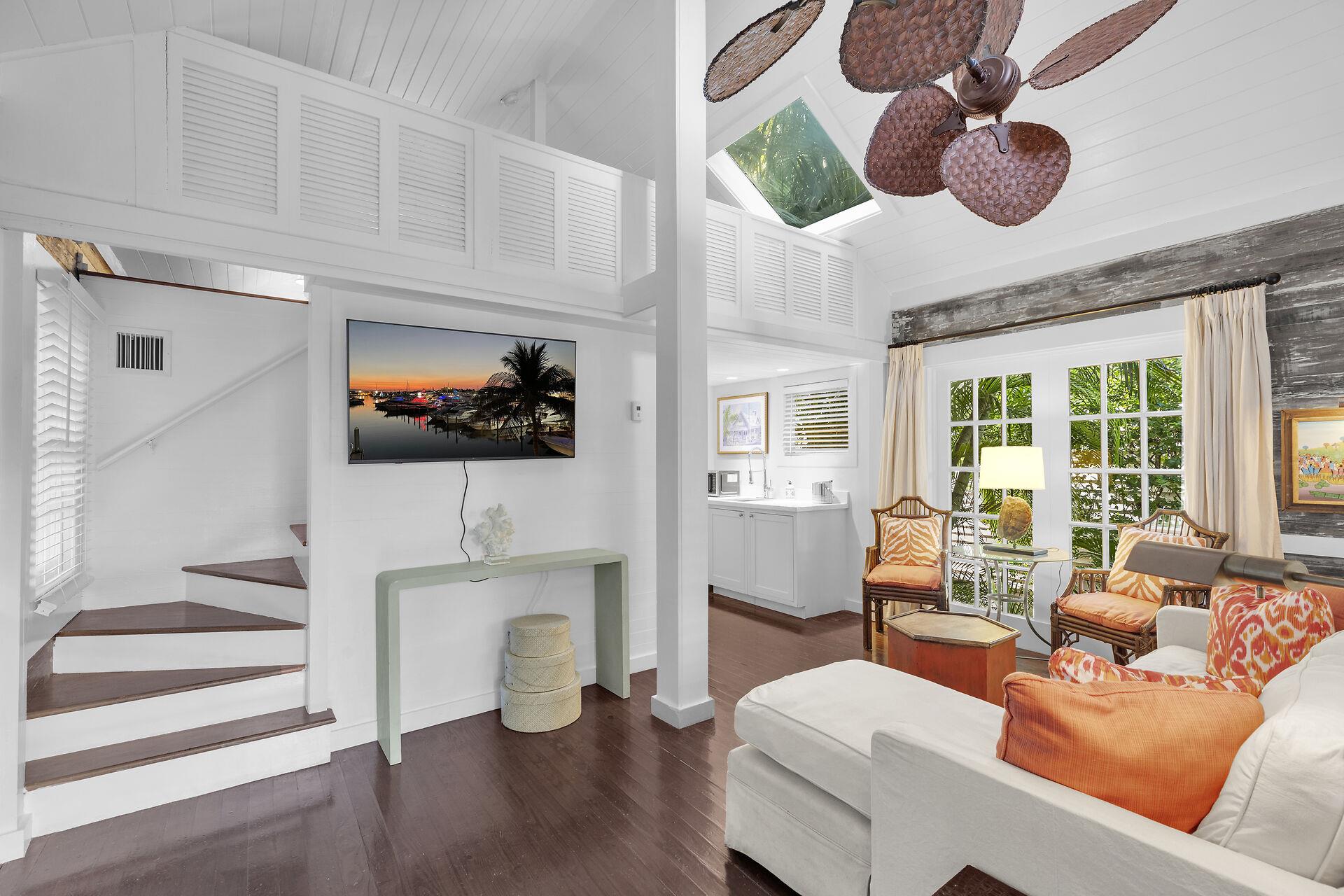 Living area with staircase to the loft