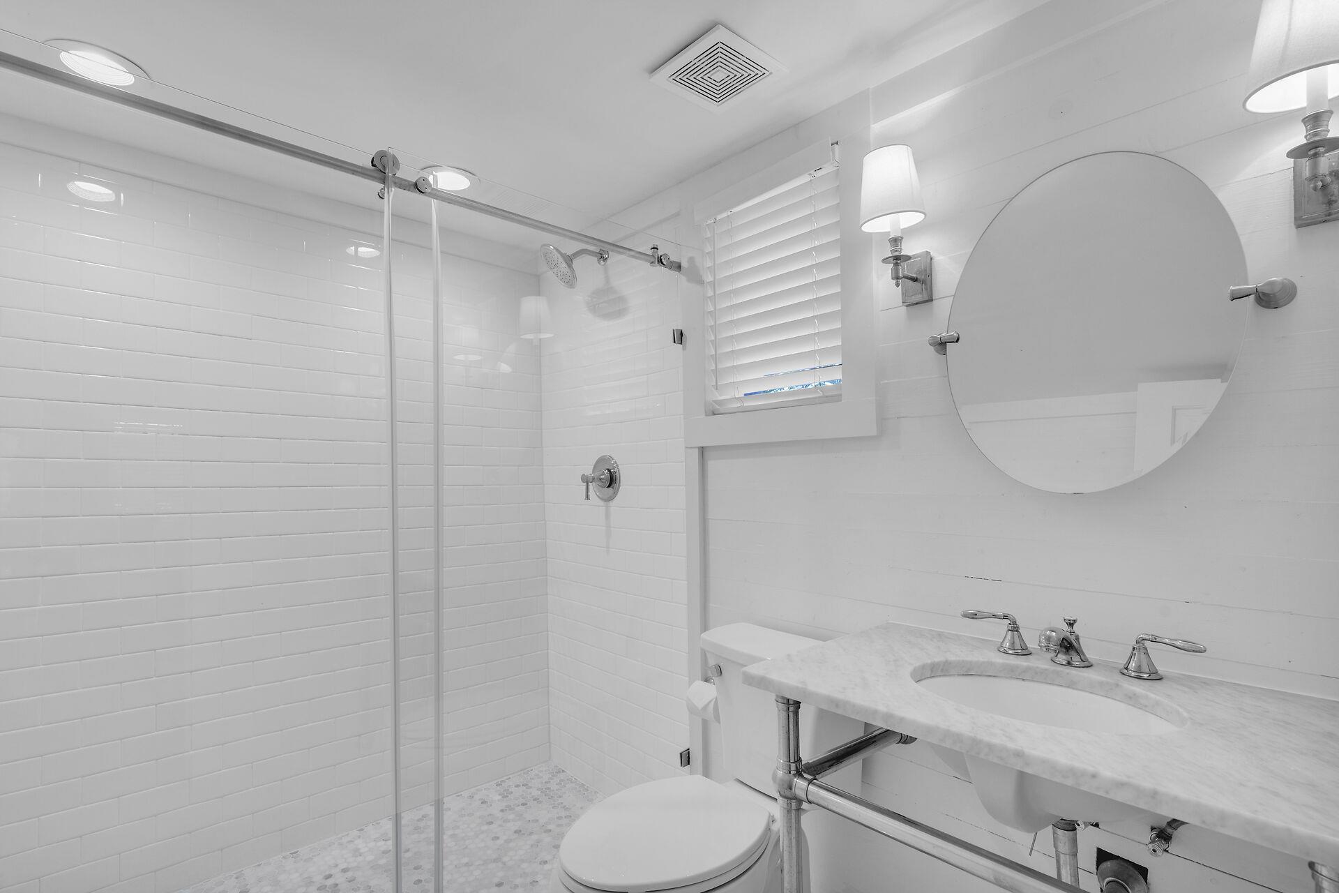 Bathroom with gorgeous glass walk in shower