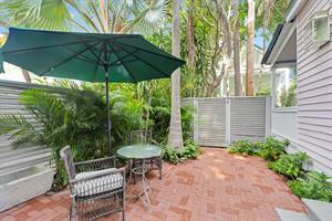 New brick patio with a bistro set