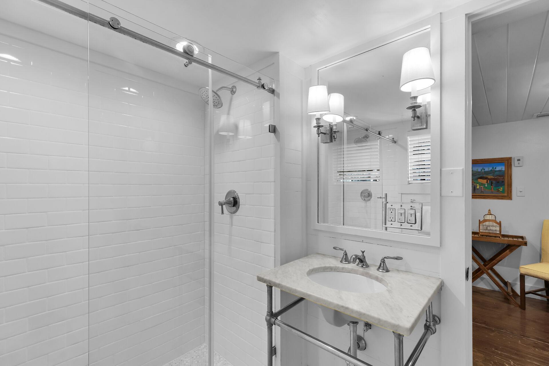 Bathroom with glass walk in shower