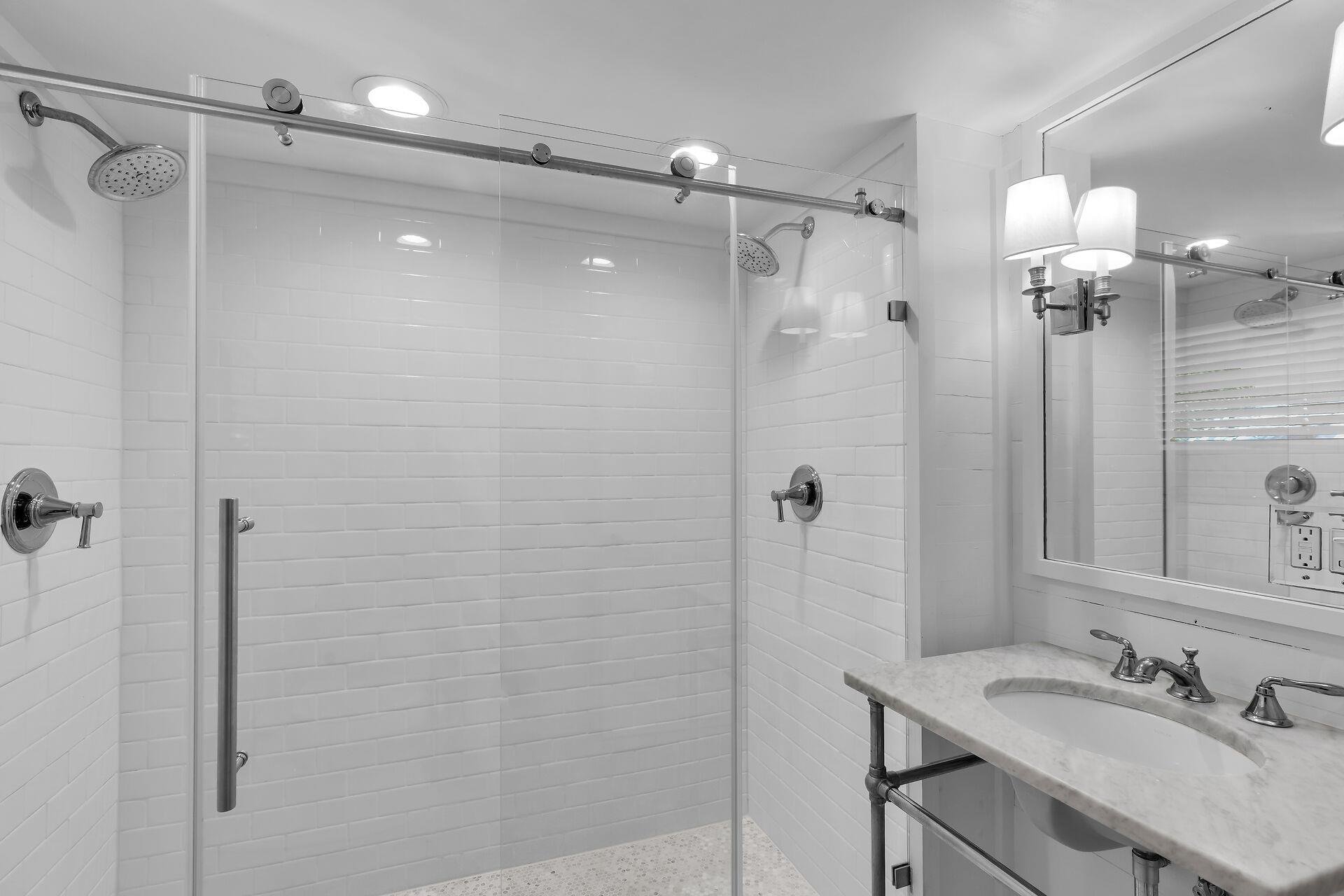 Dual shower heads and subway tile