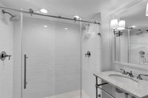 Dual shower heads and subway tile