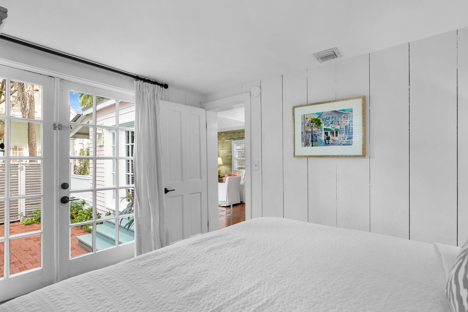 French doors lead to a private patio