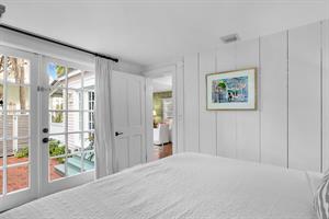 French doors lead to a private patio