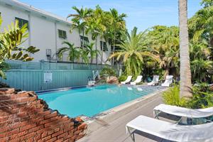 Shared pool with loungers for relaxing