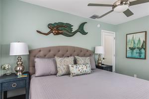 Comfy king bed with bedside lighting.